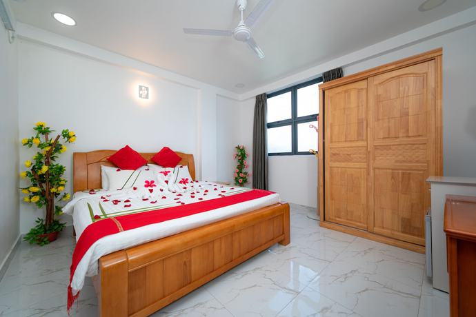 Imagen de la habitación del Hotel White Beach Holiday. Foto 16