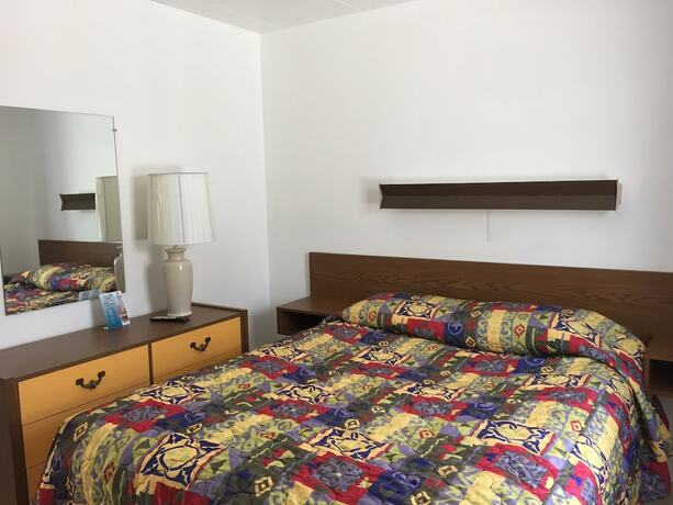 Imagen de la habitación del Hotel White Caps Motel. Foto 12