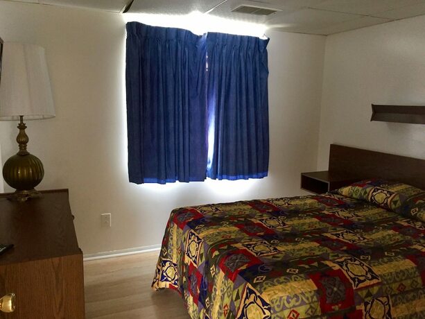 Imagen de la habitación del Hotel White Caps Motel. Foto 13