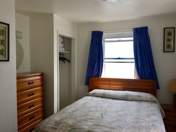 Imagen de la habitación del Hotel White Caps Motel. Foto 14