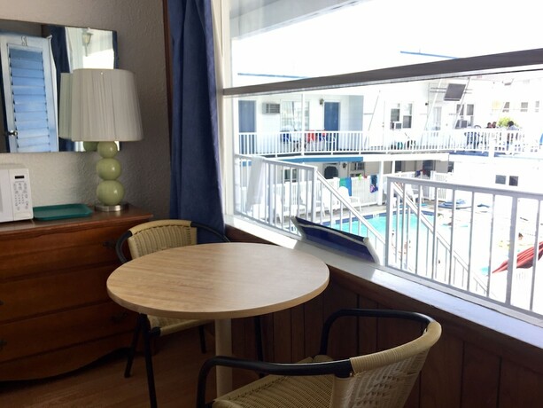 Imagen de la habitación del Hotel White Caps Motel. Foto 15