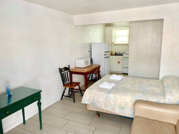 Imagen de la habitación del Hotel White Caps Motel. Foto 16