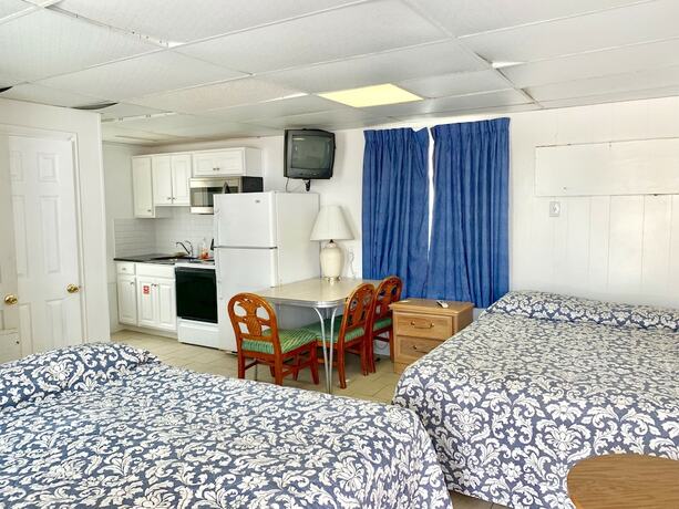 Imagen de la habitación del Hotel White Caps Motel. Foto 17