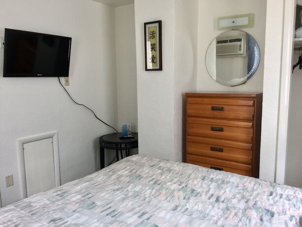 Imagen de la habitación del Hotel White Caps Motel. Foto 18