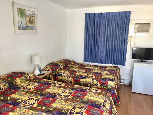 Imagen de la habitación del Hotel White Caps Motel. Foto 20