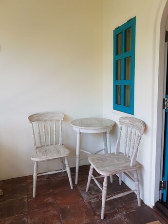 Imagen de la habitación del Hotel White Coconut Cottage. Foto 25