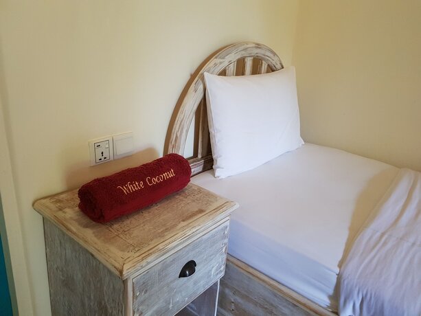Imagen de la habitación del Hotel White Coconut Cottage. Foto 27