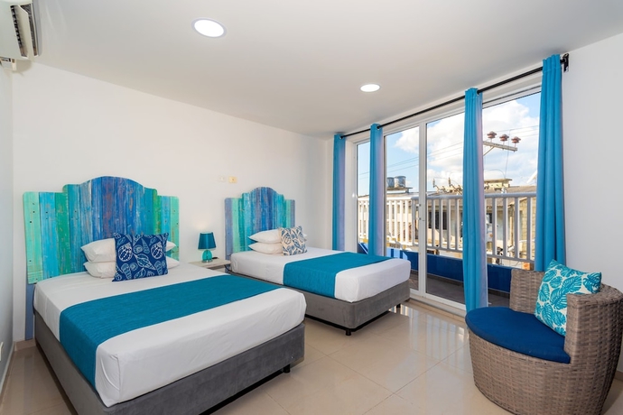 Imagen de la habitación del Hotel White Coral Apartasuite. Foto 3