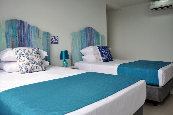 Imagen de la habitación del Hotel White Coral Apartasuite. Foto 9