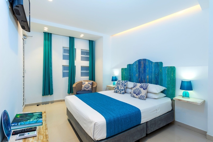 Imagen de la habitación del Hotel White Coral Apartasuite. Foto 13