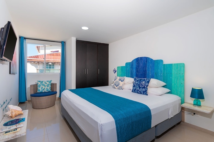 Imagen de la habitación del Hotel White Coral Apartasuite. Foto 16