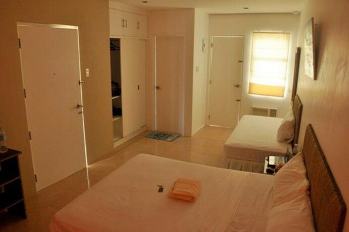 Imagen de la habitación del Hotel White Coral, Station 1. Foto 19