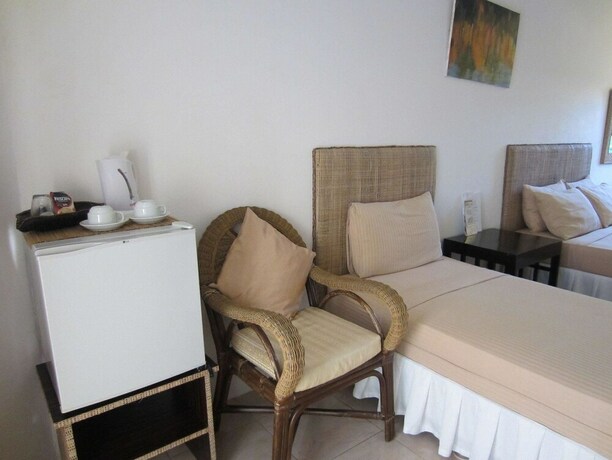 Imagen de la habitación del Hotel White Coral, Station 1. Foto 26
