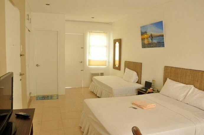 Imagen de la habitación del Hotel White Coral, Station 1. Foto 27