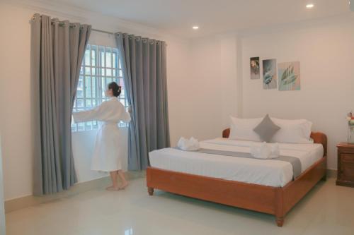 Imagen de la habitación del Hotel White Corner, Sangkat Olympic. Foto 19