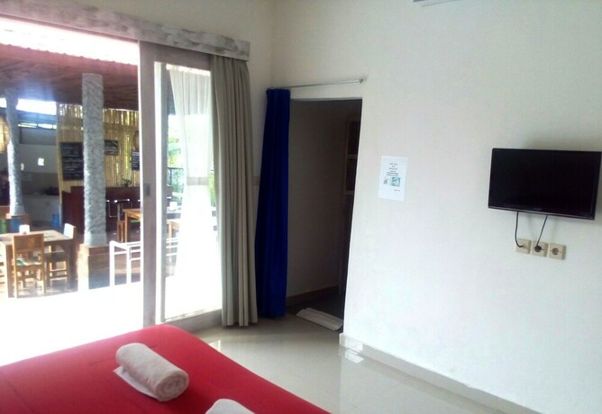 Imagen de la habitación del Hotel White Dove Villa. Foto 22