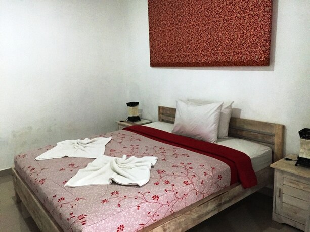 Imagen de la habitación del Hotel White Dove Villa. Foto 28