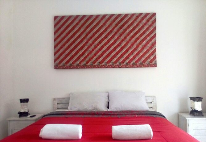 Imagen de la habitación del Hotel White Dove Villa. Foto 32