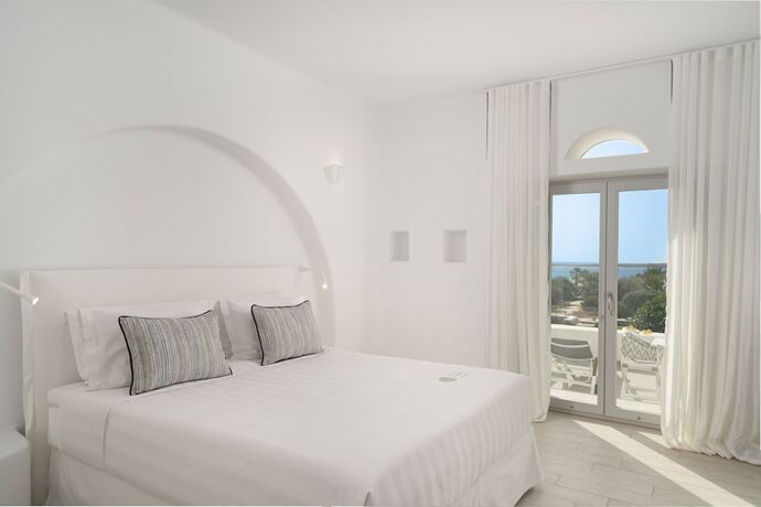 Imagen de la habitación del Hotel White Dunes Luxury Boutique. Foto 14