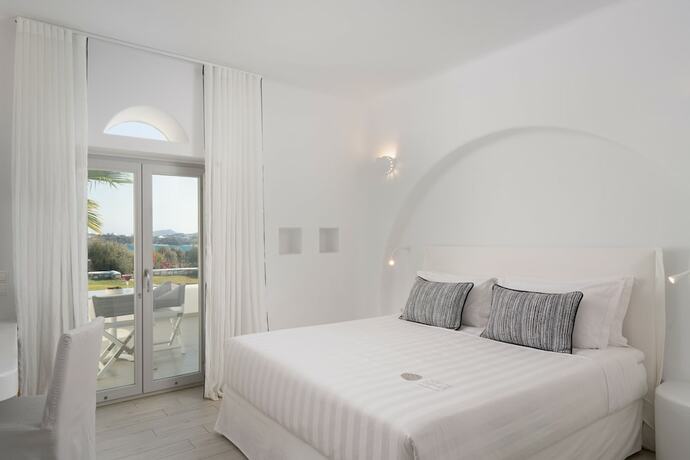 Imagen de la habitación del Hotel White Dunes Luxury Boutique. Foto 16