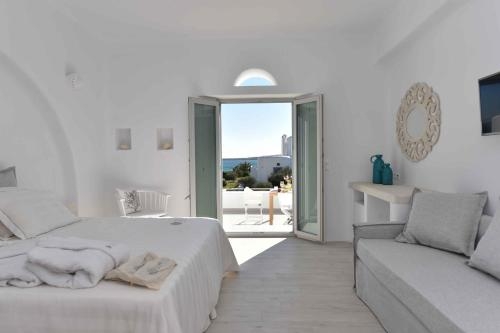 Imagen de la habitación del Hotel White Dunes Luxury Suites. Foto 9