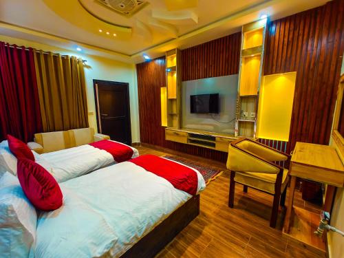 Imagen de la habitación del Hotel White Forest Kalam. Foto 16