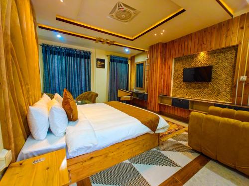 Imagen de la habitación del Hotel White Forest Kalam. Foto 19