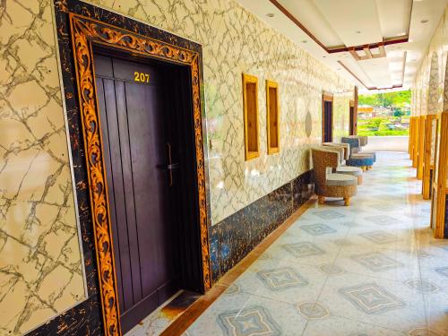 Imagen de la habitación del Hotel White Forest Kalam. Foto 20