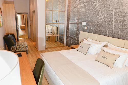 Imagen de la habitación del Hotel White Hill. Foto 14