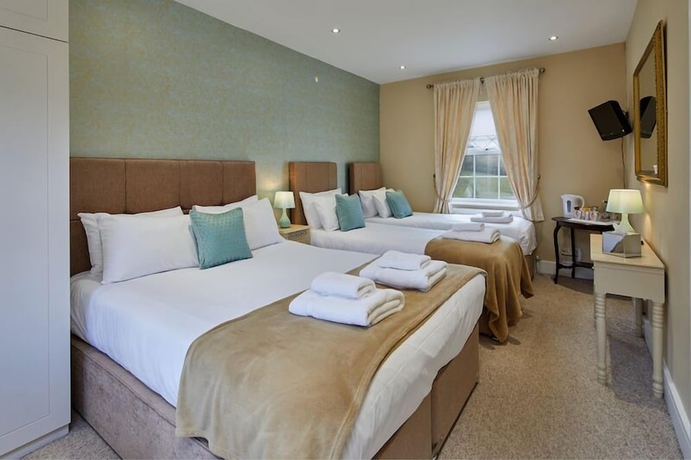 Imagen de la habitación del Hotel White Horse Farm Inn. Foto 10