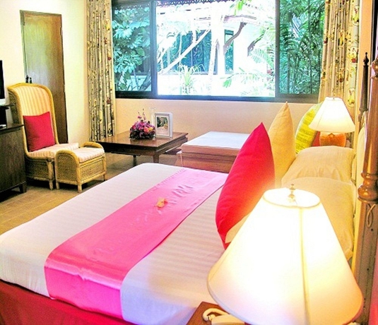 Imagen de la habitación del Hotel White House Beach Resort. Foto 6