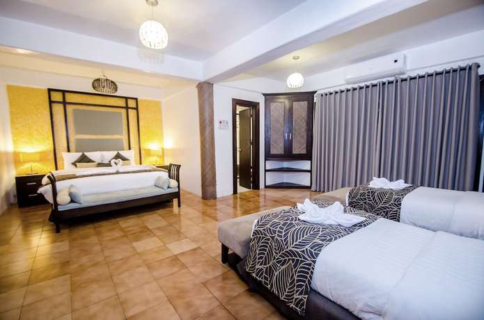 Imagen de la habitación del Hotel White House Beach Resort, Station 1. Foto 4