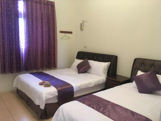Imagen de la habitación del Hotel White House, Dongbao. Foto 16