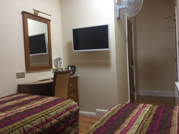 Imagen de la habitación del Hotel White House. Foto 15