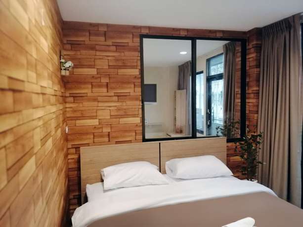 Imagen de la habitación del Hotel White House Hostel, Bangkok. Foto 11