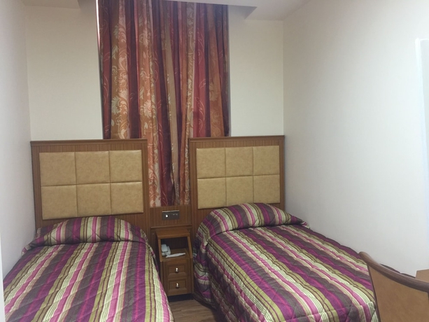 Imagen de la habitación del Hotel White House, Londres. Foto 5