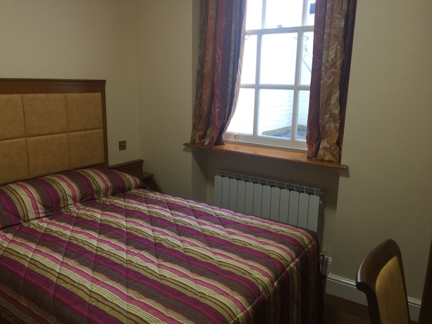 Imagen de la habitación del Hotel White House, Londres. Foto 10