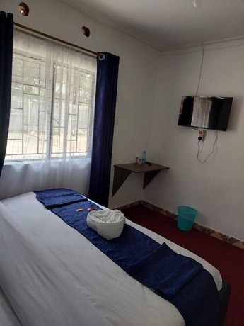 Imagen de la habitación del Hotel White House Lounge and Accommodation. Foto 8