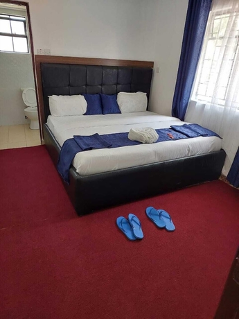 Imagen de la habitación del Hotel White House Lounge and Accommodation. Foto 9