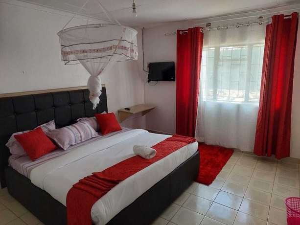 Imagen de la habitación del Hotel White House Lounge and Accommodation. Foto 10