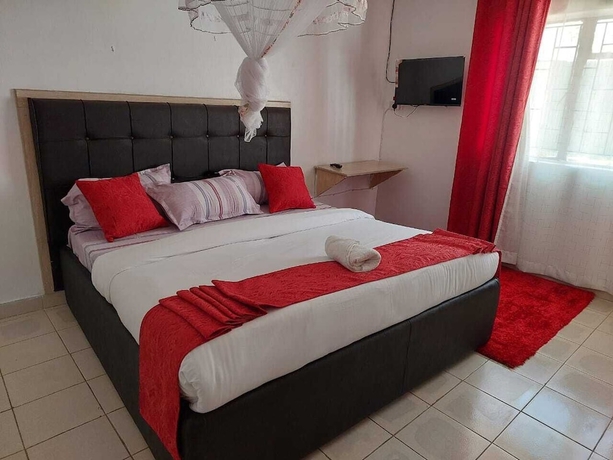 Imagen de la habitación del Hotel White House Lounge and Accommodation. Foto 11