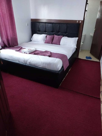 Imagen de la habitación del Hotel White House Lounge and Accommodation. Foto 12