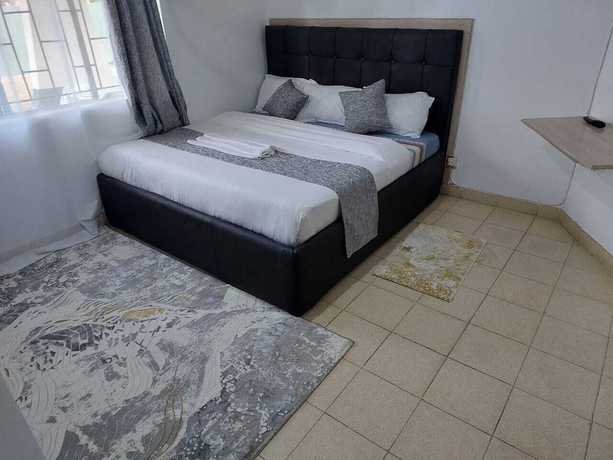 Imagen de la habitación del Hotel White House Lounge and Accommodation. Foto 15