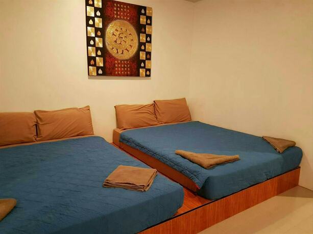 Imagen de la habitación del Hotel White House Mountian Beach Resort. Foto 19