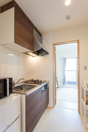 Imagen de la habitación del Hotel White House Tsuruhashi. Foto 20
