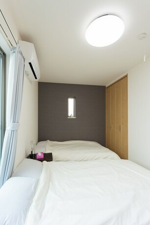 Imagen de la habitación del Hotel White House Tsuruhashi. Foto 23