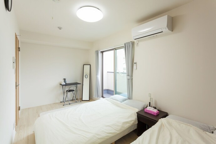 Imagen de la habitación del Hotel White House Tsuruhashi. Foto 26