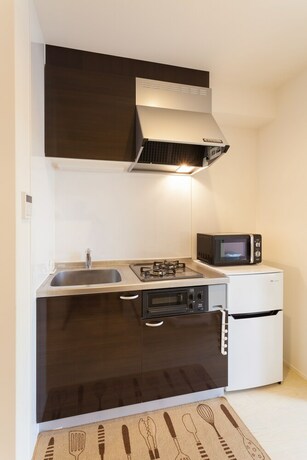 Imagen de la habitación del Hotel White House Tsuruhashi. Foto 30