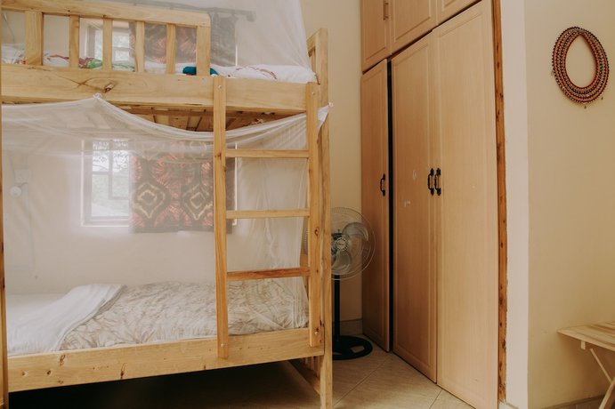 Imagen de la habitación del Hotel White House of Tanzania - Hostel. Foto 4