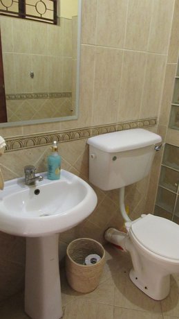 Imagen de la habitación del Hotel White House of Tanzania - Hostel. Foto 5